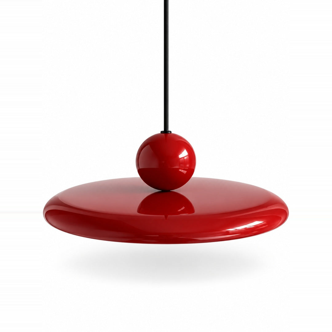 Pendant light with a glossy red disc shade, matching red sphere, and black suspension cord against a white background.