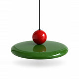 Pendant light with a glossy green disc shade, red sphere, and black suspension cord against a white background.