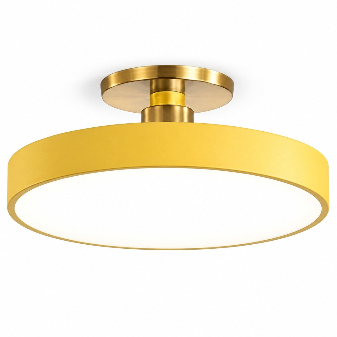 A modern semi-flush mount ceiling light fixture featuring a wide, circular yellow fabric shade and brushed gold metal hardware, shown against a plain white background.