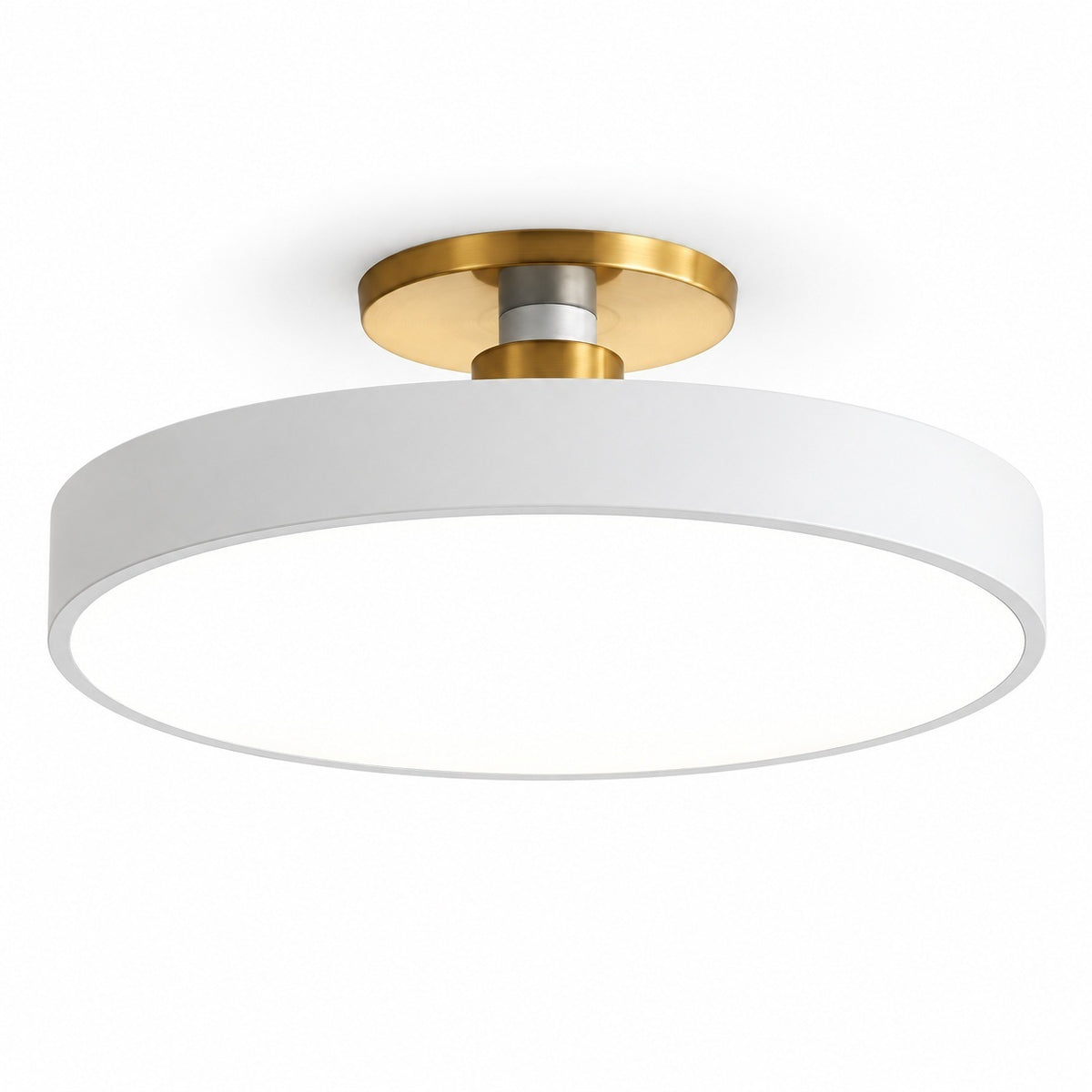 A modern semi-flush mount ceiling light featuring a wide white cylindrical shade and a brushed gold circular ceiling mount.