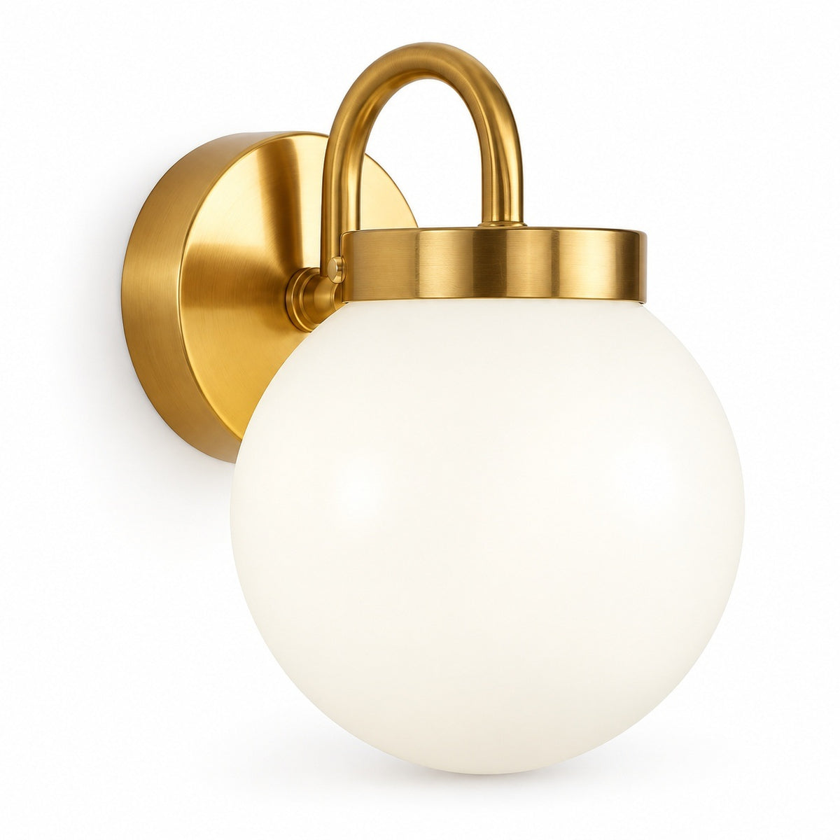 Gold wall sconce with a curved arm, round backplate, and smooth white glass globe against a white background.