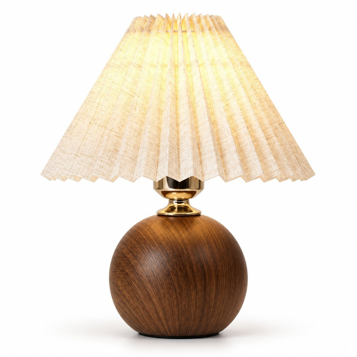 A table lamp with a spherical dark brown wooden base, a gold-finished neck, and a pleated beige fabric shade glowing with warm light, set against a plain white background.