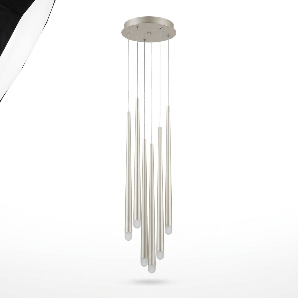 Silver pendant chandelier with six slender tubular lights hanging at staggered heights from a round canopy against a white background.