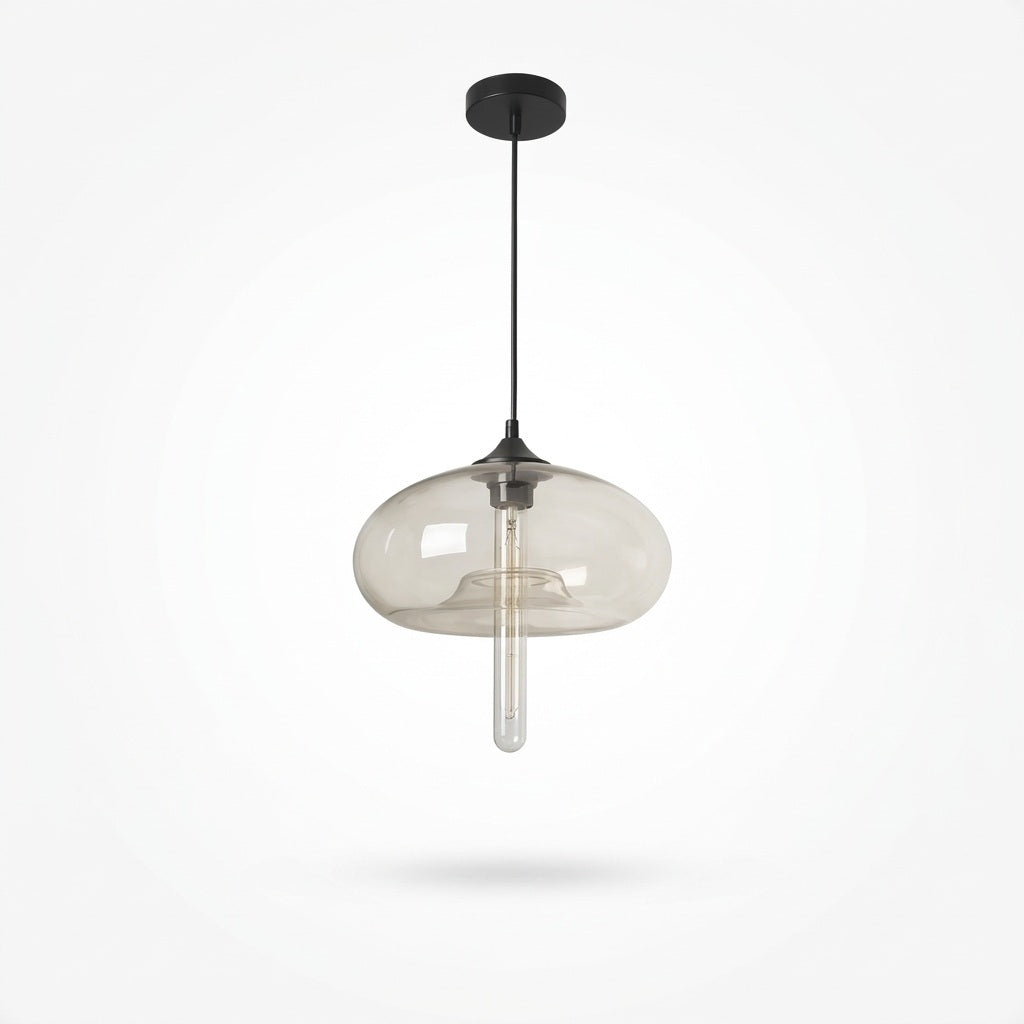 A modern pendant light with a clear smoked glass dome shade and a black ceiling canopy and cord, shown against a plain white background.