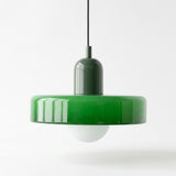 A modern pendant light with a glossy green circular shade, a dark green cylindrical neck, and a white globe bulb, suspended against a plain white background.