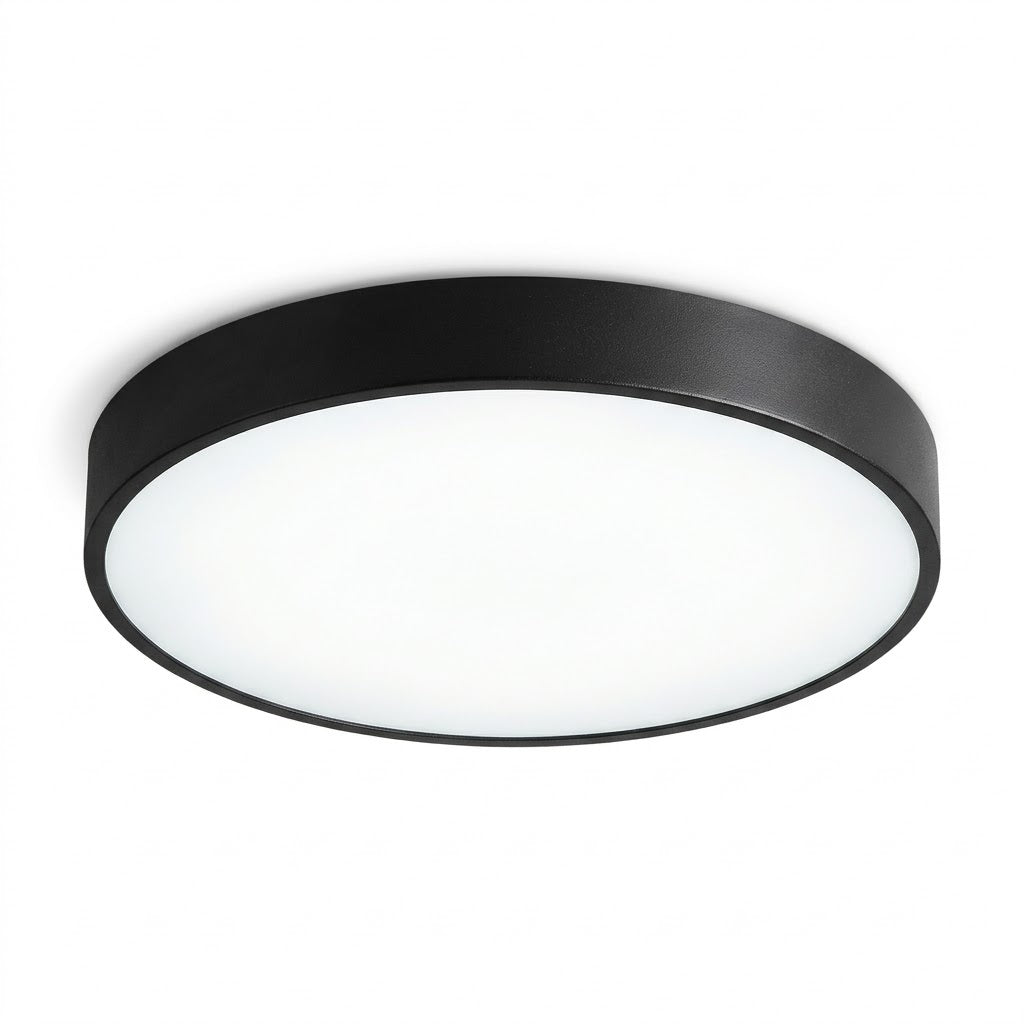 A modern flush-mount circular ceiling light with a matte black metal frame and a white frosted diffuser, shown against a plain white background.