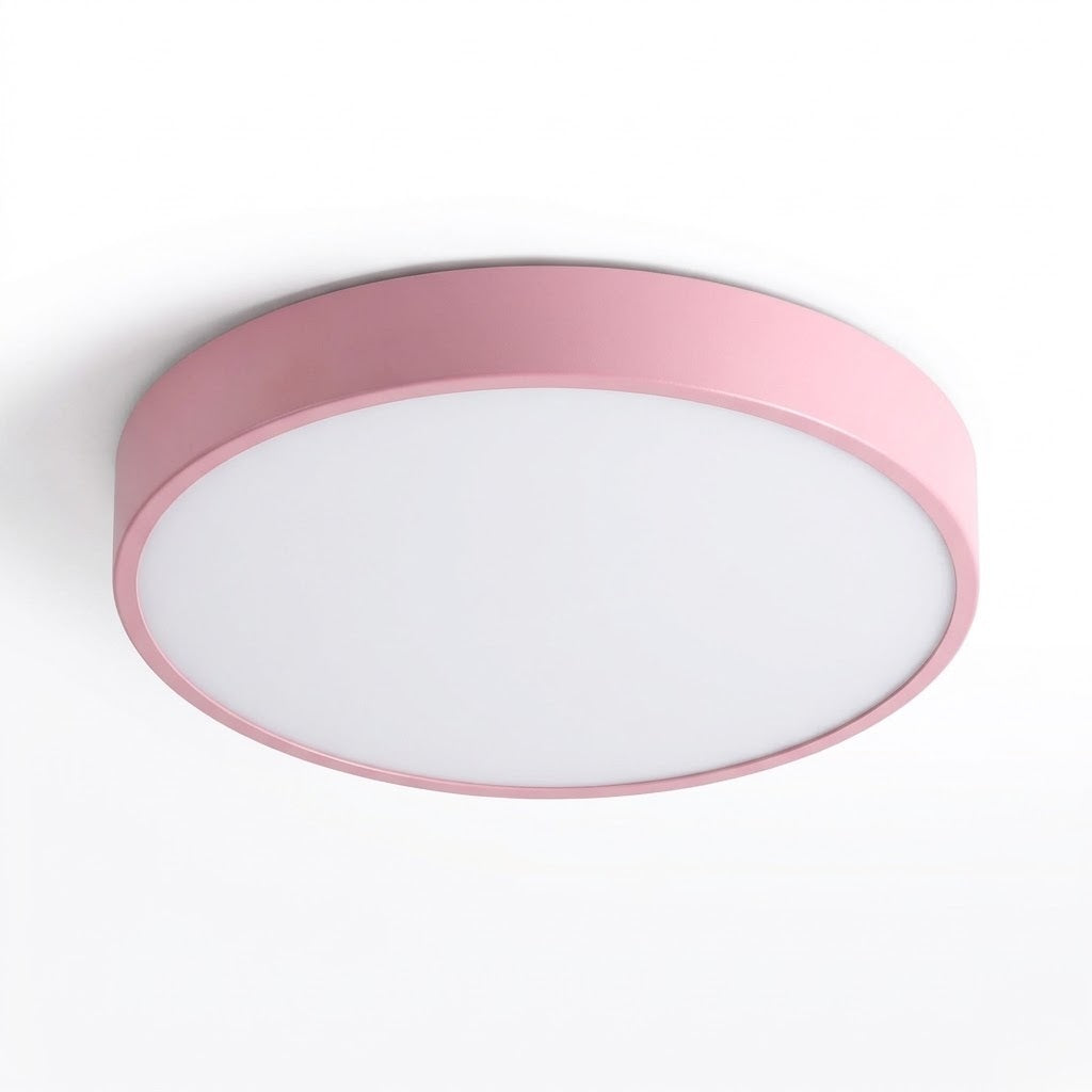 A modern flush-mount ceiling light with a circular white diffuser and a metallic pink outer frame, shown against a plain white background.