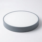 Round ceiling light with a gray rim and white diffuser, shown at an angle against a white background.