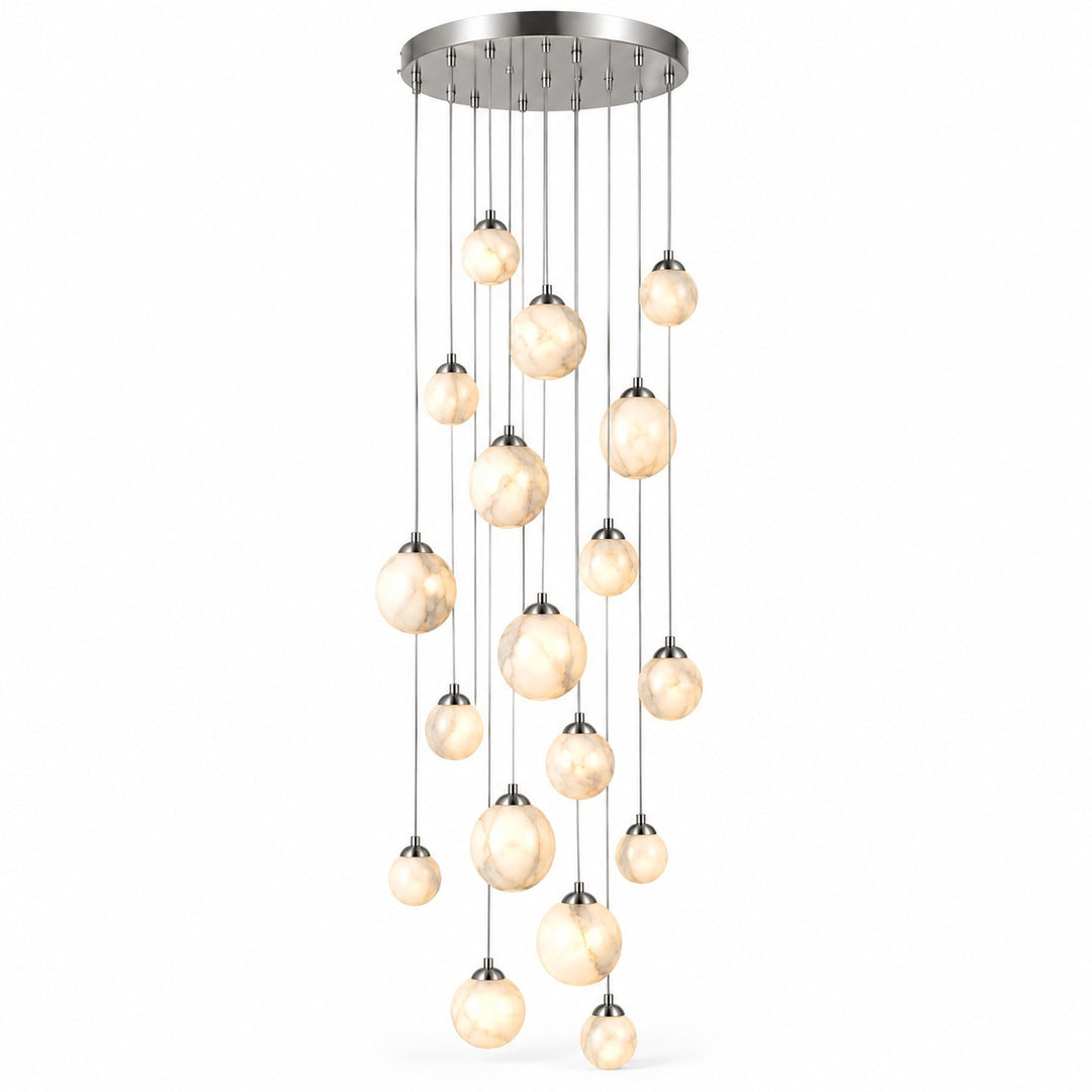 A modern multi-light chandelier with a circular brushed nickel ceiling canopy and multiple hanging glass globes, shown against a plain white background.