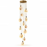 A modern multi-light chandelier with a gold-finished ceiling canopy and multiple hanging glass globes that glow warm white when illuminated, shown against a plain white background.