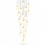 A modern multi-light chandelier featuring multiple spherical frosted glass globes suspended from thin black cords with gold-toned hardware, set against a solid white background.