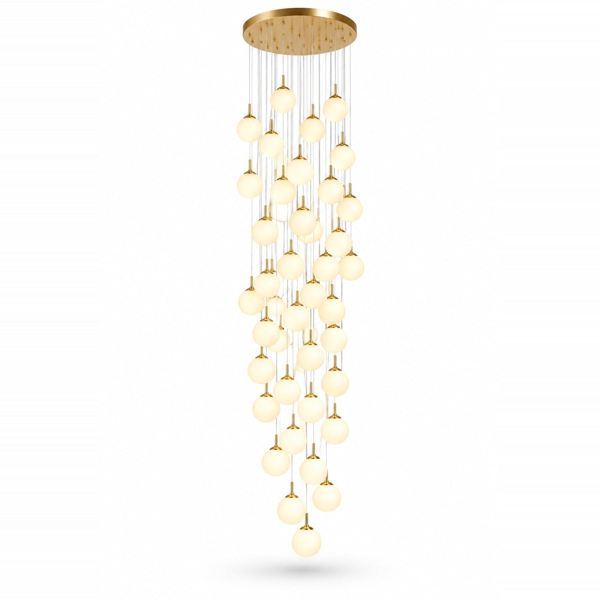 A modern multi-light chandelier with a gold circular ceiling canopy and multiple dangling spherical glass shades in graduated sizes, shown against a plain white background.