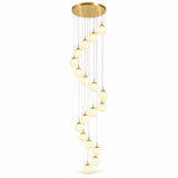 A modern multi-light linear chandelier with a brushed gold circular canopy, slim suspension wires, and multiple warm white frosted glass globe bulbs arranged in a cascading spiral, shown against a plain white background.