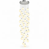 A modern multi-light linear chandelier with a circular silver ceiling canopy and multiple vertical strands of glowing warm white spherical bulbs, shown against a plain white background.