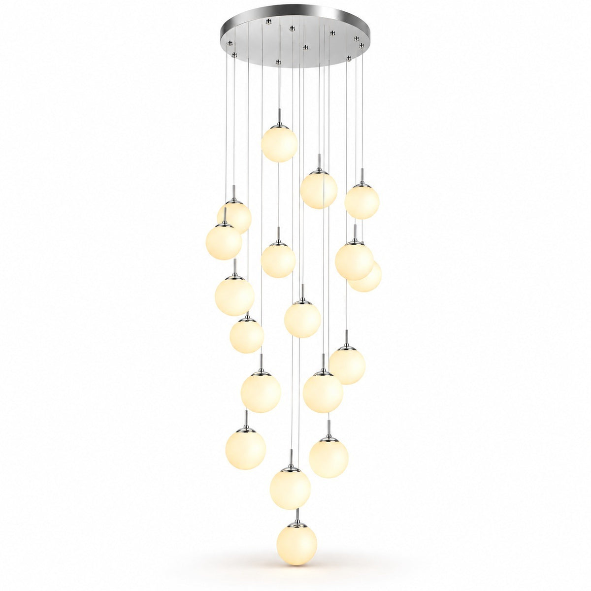 A modern multi-light chandelier pendant fixture with a circular silver ceiling canopy and multiple hanging glass globes emitting a warm yellow glow, shown against a plain white background.