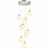 A modern multi-light linear chandelier with nine warm white frosted glass globe shades hanging from a brushed nickel circular canopy against a white background.