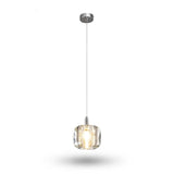 A single-light chandelier with a clear rounded crystal shade and polished silver canopy glows warmly against a white background.