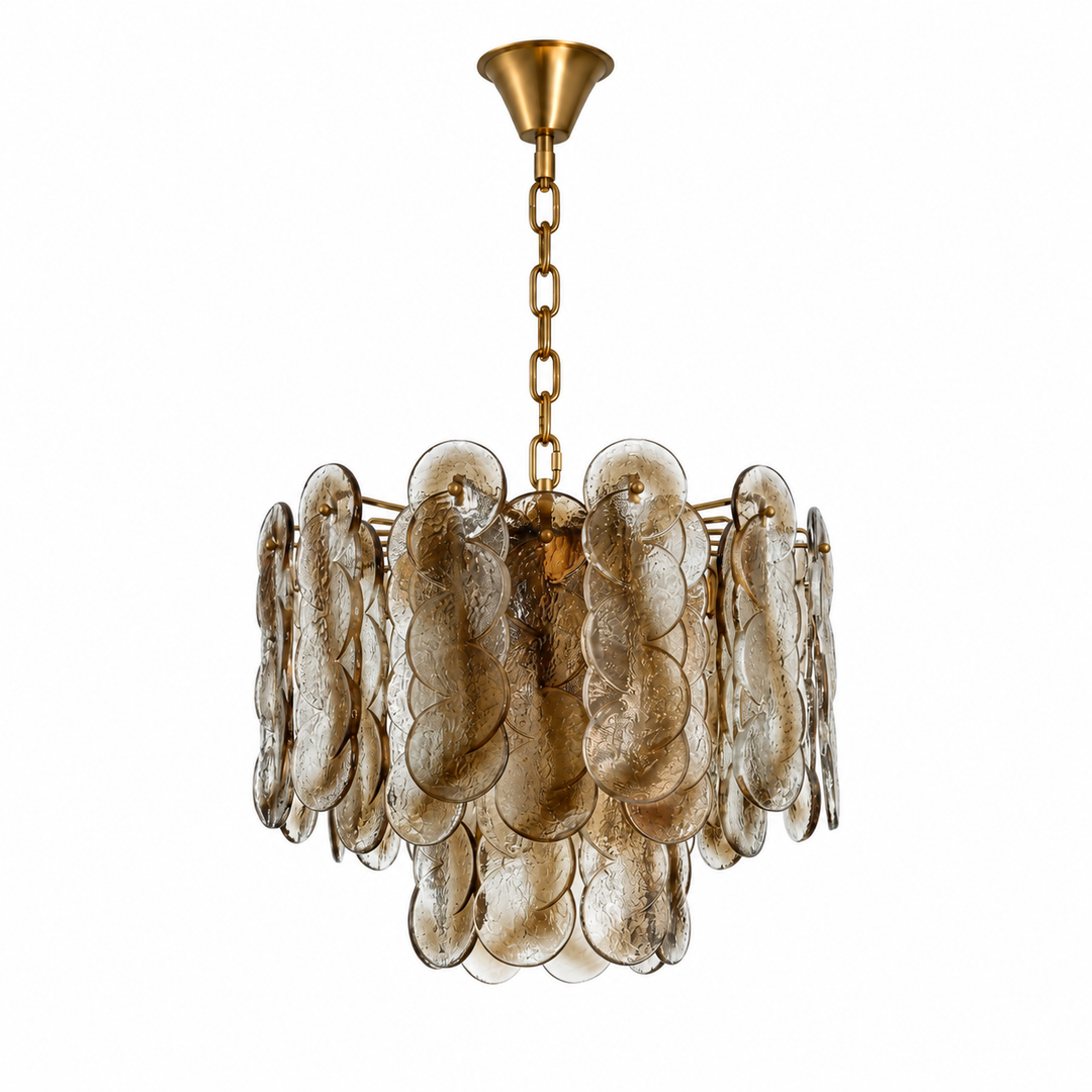A modern multi-light chandelier featuring textured, translucent amber-brown glass disc leaves suspended from a polished gold brass frame and chain.