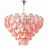 A modern chandelier featuring a cascading arrangement of translucent pink glass petal-like shades suspended from a polished silver-toned metal frame and chain, shown against a solid white background.