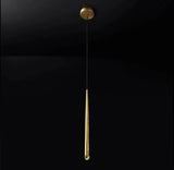 Chandelier shown with a single tapered brass tube, crystal tip, black cord and matching round canopy against a black background.