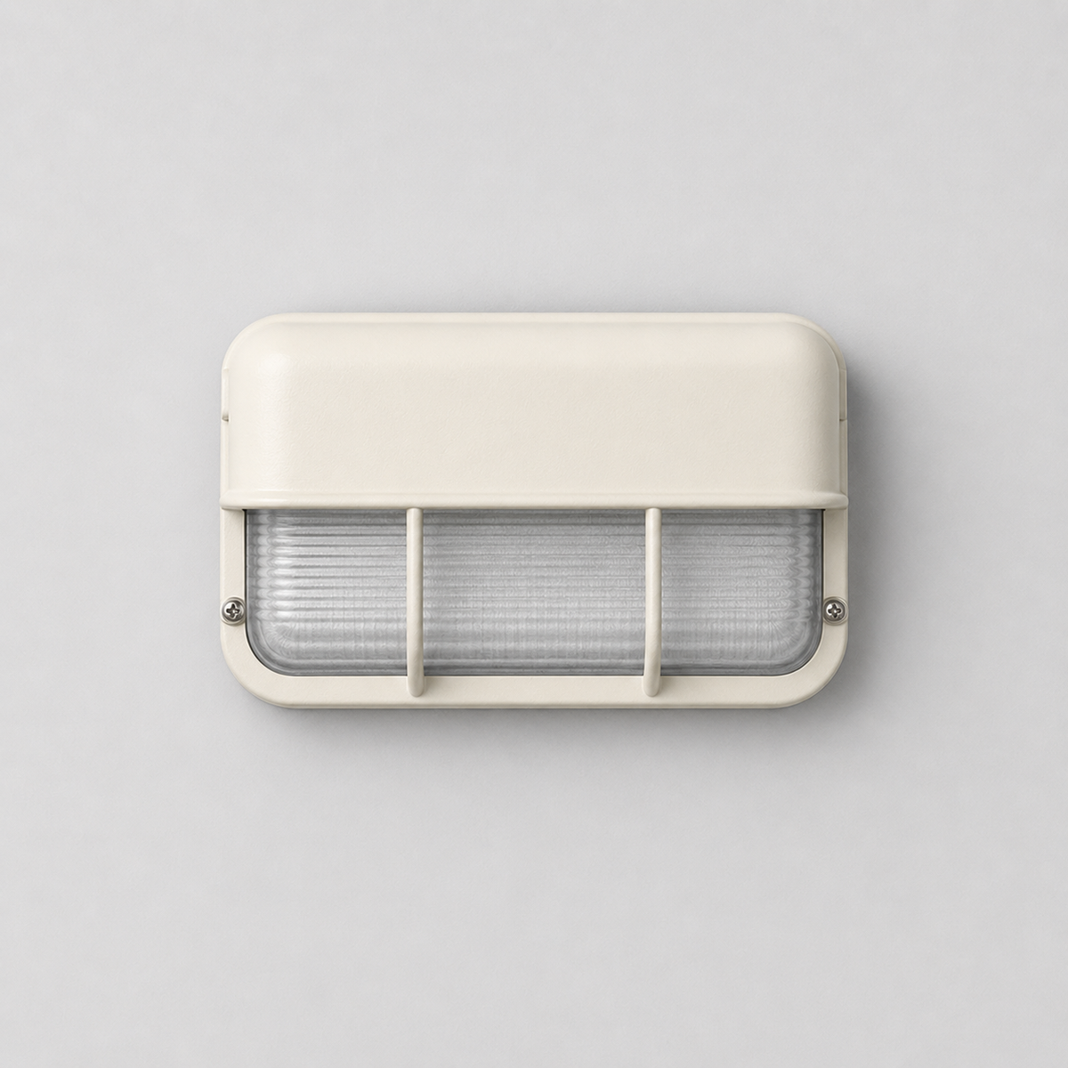 Front view of an unlit off-white wall sconce with ribbed glass, two protective bars, and visible screws against a gray wall.