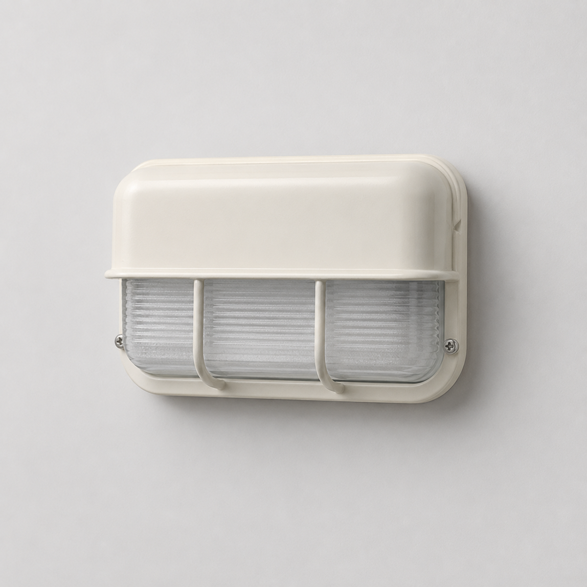 Unlit off-white wall sconce with ribbed glass and protective bars, shown at an angle against a pale gray wall.