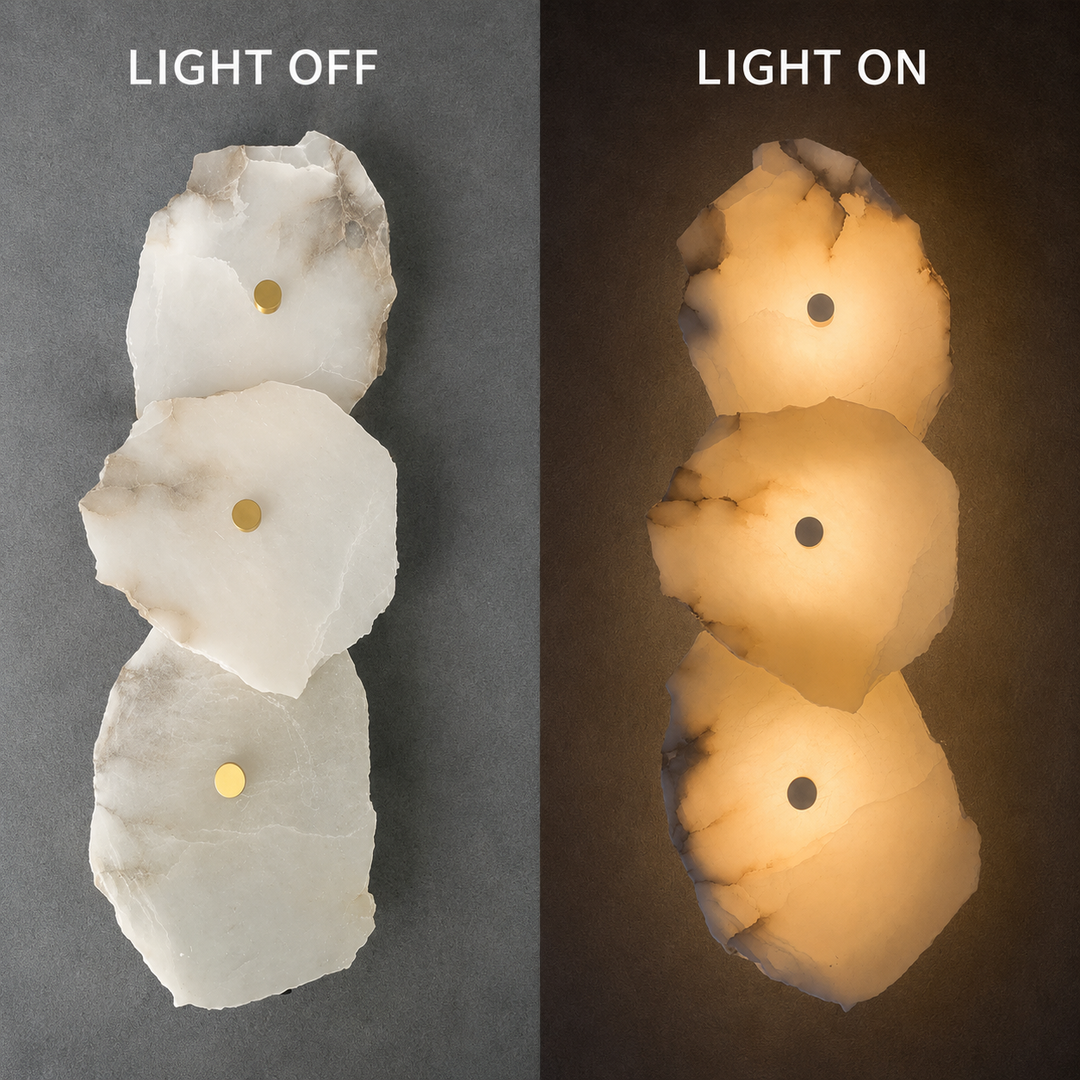 Three irregular stone-like wall sconces shown side by side, labeled LIGHT OFF on the left and LIGHT ON on the right, demonstrating their warm illuminated appearance against a dark background.