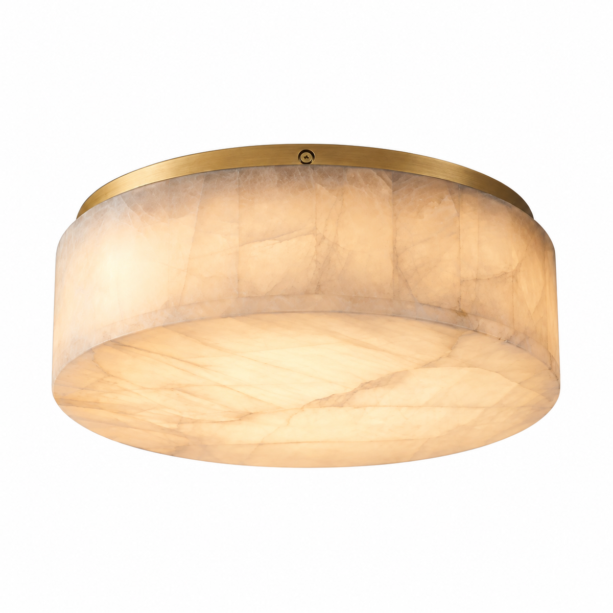A flush-mount drum ceiling light featuring a warm, glowing translucent stone shade with natural veining and a brushed gold metal top rim, shown against a solid white background.