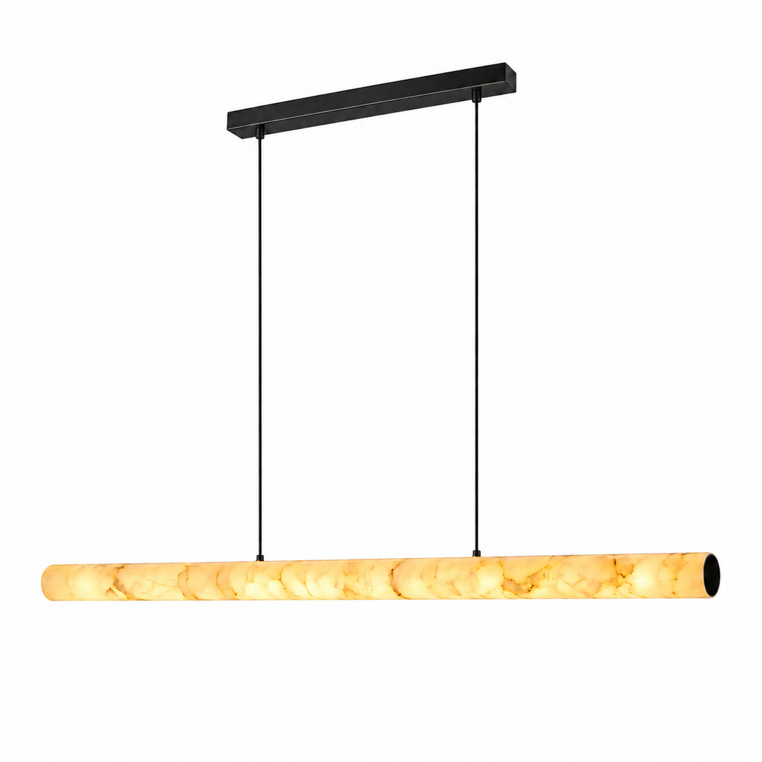 A modern linear pendant light with a warm yellow-orange marbled stone or acrylic shade and a matte black ceiling canopy and suspension rods, shown against a plain white background.