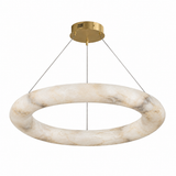 Cream alabaster ring chandelier with beige veining, suspension wires and a brass ceiling canopy against a white background.