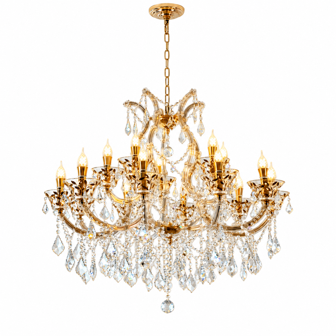 A gold-finished multi-light crystal chandelier with ornate curved arms, clear hanging teardrop crystals, and illuminated candle-style bulbs, shown against a plain white background.