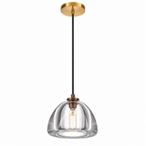 A modern pendant light with a clear glass dome shade, a black cord, and antique brass hardware, shown against a plain white background.