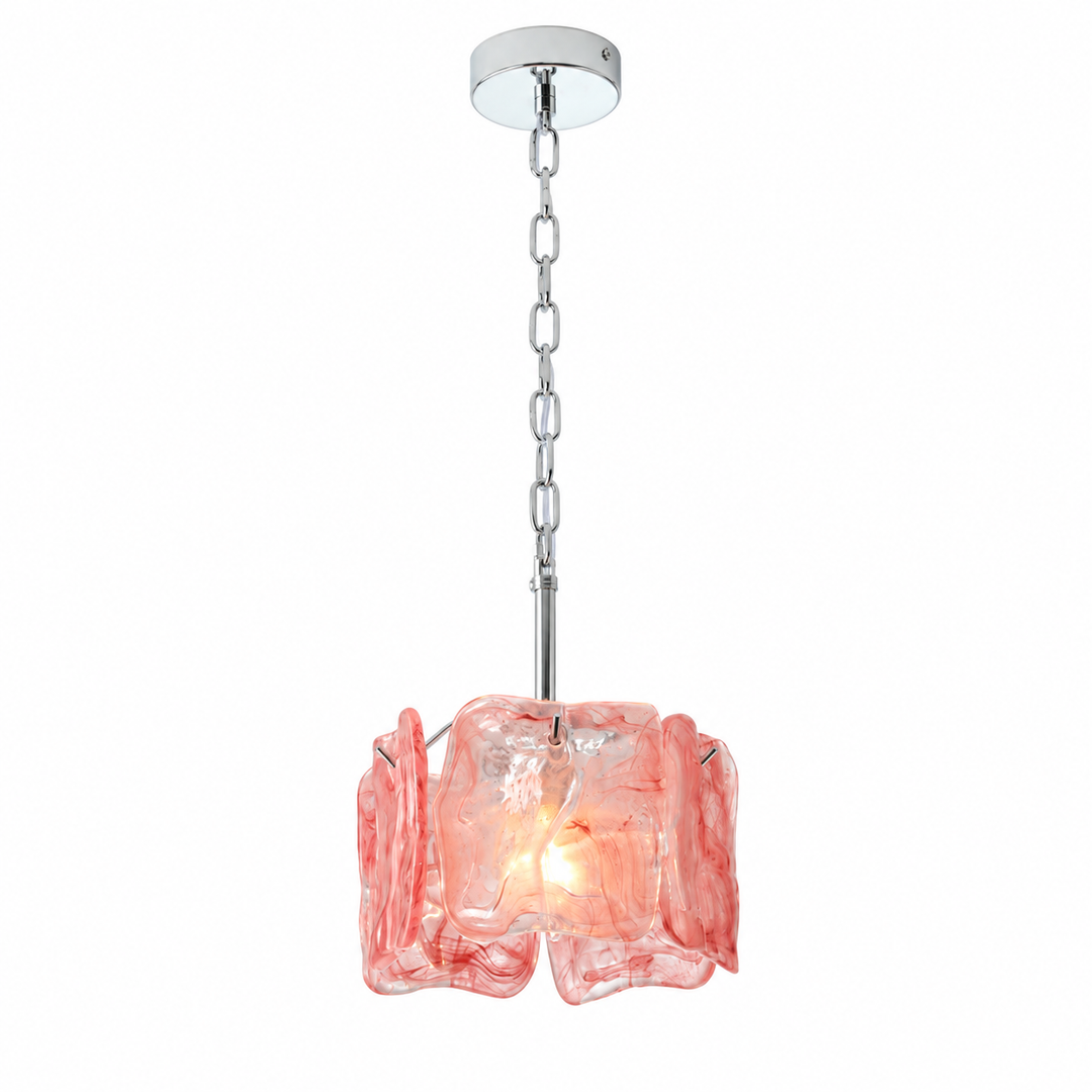 A modern pendant light with a polished chrome chain and ceiling canopy, featuring a sculptural, wavy glass shade illuminated with a warm pink glow.
