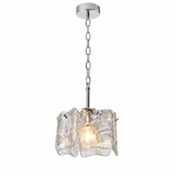 A modern pendant light fixture with a polished silver-tone chain and ceiling canopy, featuring a cluster of irregular, textured clear glass shades that glow with warm light from within, shown against a plain white background.