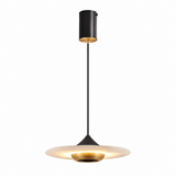 A modern pendant light fixture with a matte black cylindrical ceiling canopy, a thin black suspension rod, and a wide, shallow disc-shaped shade in a warm cream or off-white tone with a brushed gold metal accent at the center and bottom rim.