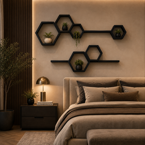 The same nine-piece matte black hexagon shelf set mounted above a bed, planted with small ferns, beside a brass table lamp on a dark wood nightstand