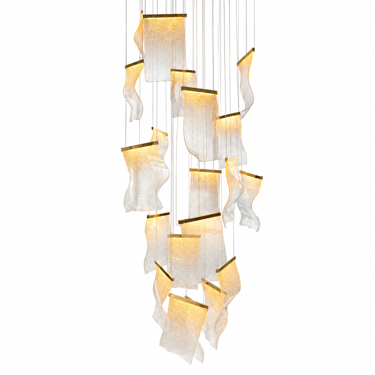 A modern multi-light linear chandelier featuring multiple wavy, translucent white fabric or mesh shades with warm yellow-gold internal lighting, suspended by thin cables against a solid white background.