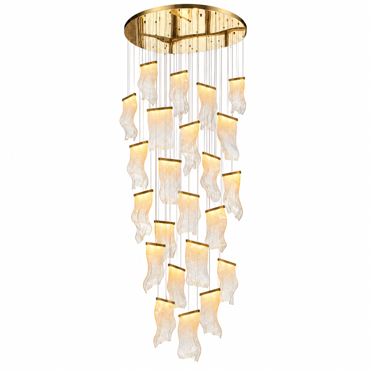 A modern multi-light chandelier with a circular gold ceiling mount, featuring multiple cascading tiers of textured, wavy clear glass shades that glow with warm light, suspended by thin gold wires against a solid white background.