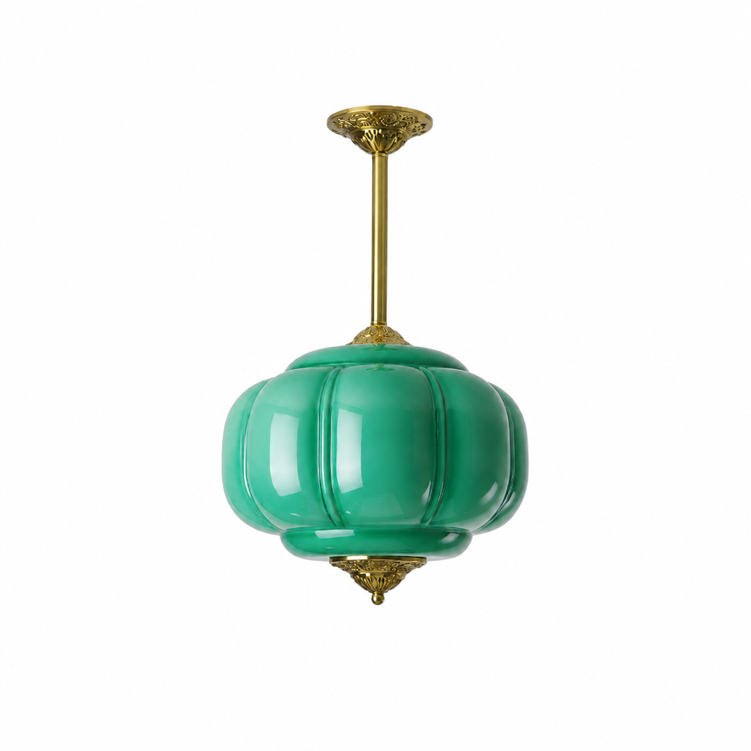 A teal green ribbed glass pendant light with a brass stem, ornate ceiling canopy, and decorative finial against a plain white background.