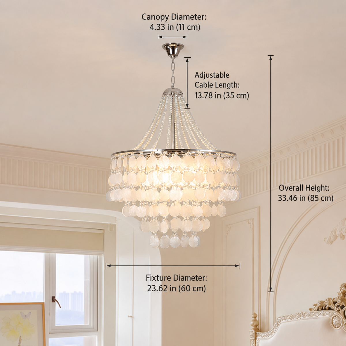 A crystal chandelier with a silver-toned canopy and frame, adorned with clear glass beads and hanging teardrop crystals, shown in a decorated room with overlaid dimension labels for canopy diameter, adjustable cable length, overall height, and fixture diameter.
