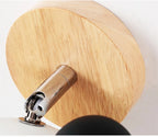 Macro of the rubberwood round wall mount and chrome adjustable arm