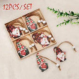 Plaid-hatted wooden gnome Christmas ornaments with white-beaded cords rest beside a divided box on beige fabric beneath a 12-piece set label.