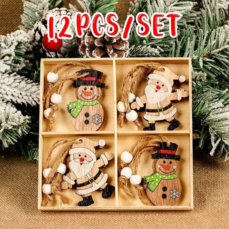 Wooden Santa and snowman Christmas ornaments with white-beaded cords fill a divided box beneath a 12-piece set label among frosted branches.