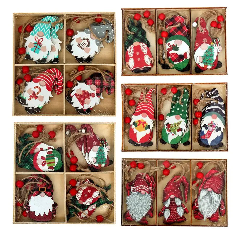 Five compartmented boxes hold colorful Christmas gnome ornaments with patterned hats, white beards, twine loops, and red beads against white.