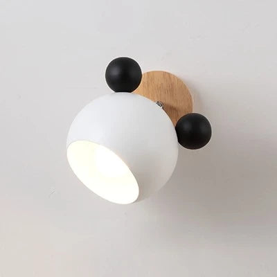 White and black bear wall sconce on a white background