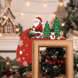 Santa door corner decoration with a long red sack, green trees, snowman and reindeer rests on a gold-colored frame.