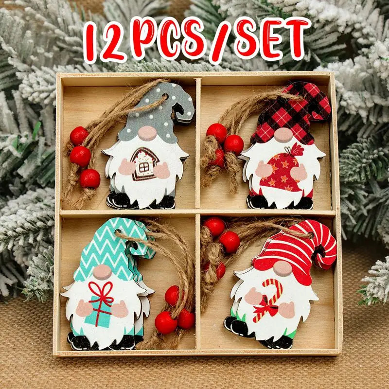 Wooden gnome Christmas ornaments with patterned hats and red-beaded cords fill a divided box beneath a 12-piece set label against frosted greenery.