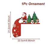 Santa door corner decoration with green trees and a red sack extending left on white, labeled 22.5 cm wide and 21.2 cm high.
