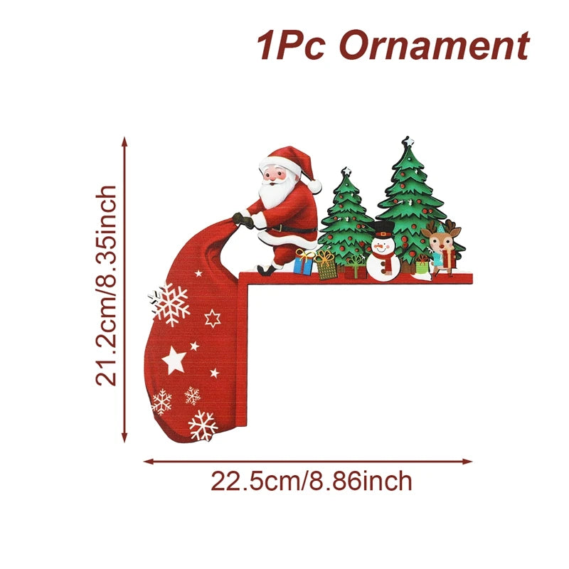 Santa door corner decoration with green trees and a red sack extending left on white, labeled 22.5 cm wide and 21.2 cm high.