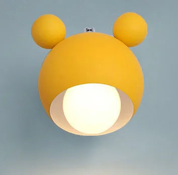 Yellow bear wall lamp on a blue background
